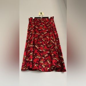 Women size small printed red Christmas season satin a line skirt